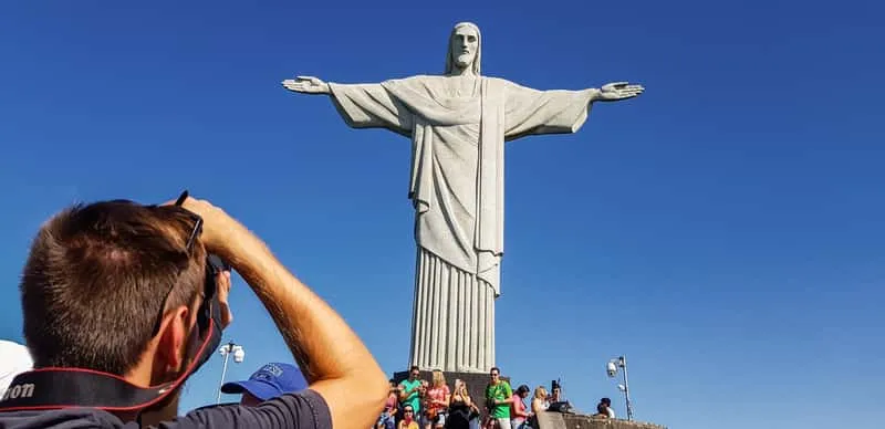 Corcovado cog train climbing through Tijuca Forest toward the statue with christ the redeemer tickets in Rio de Janeiro
